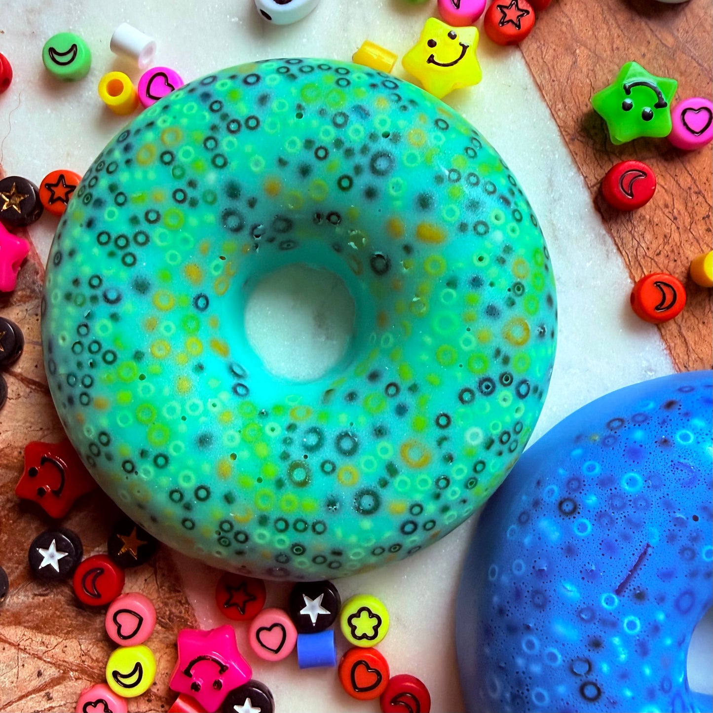 green reusable doughnut picky pad sensory fidget toy 