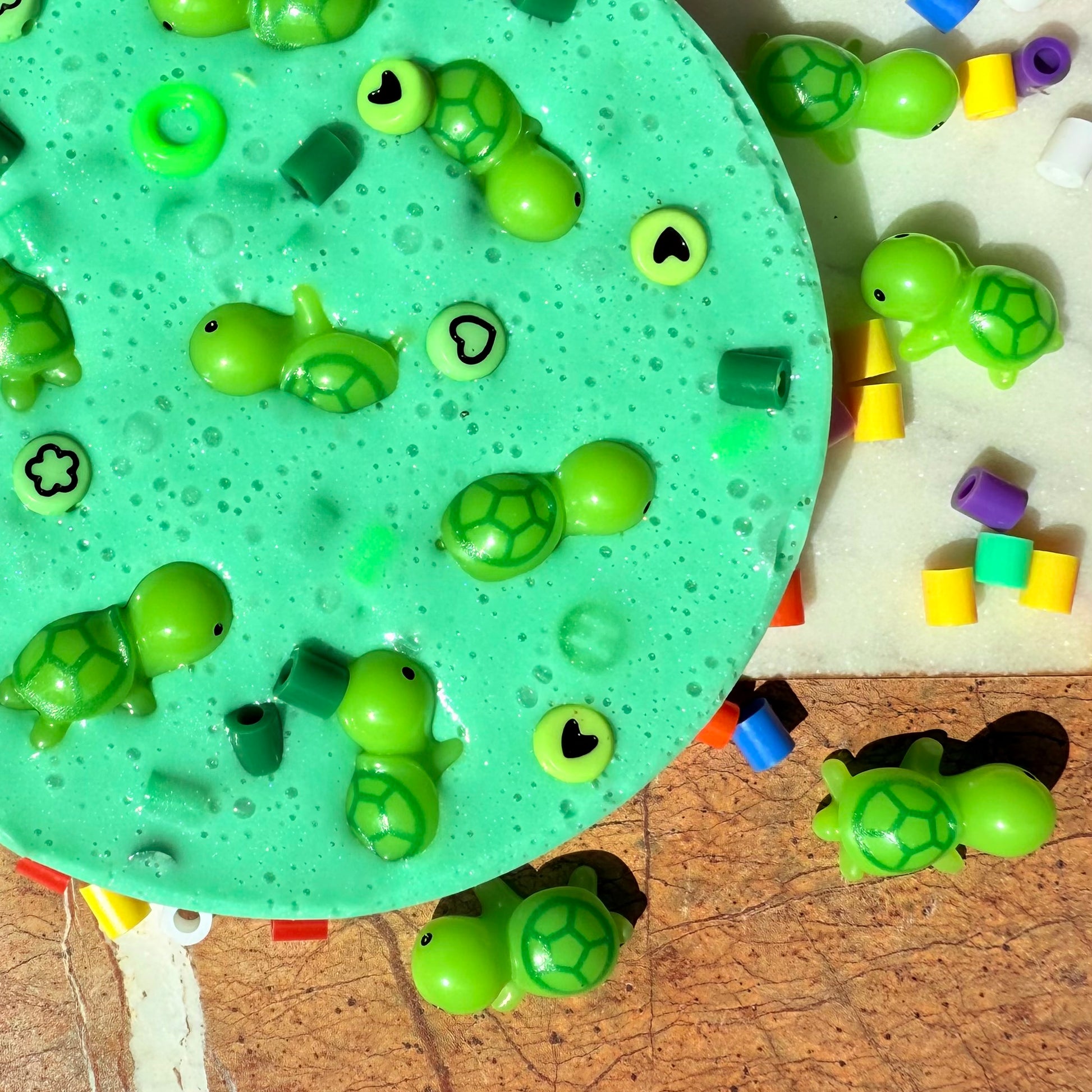 Close up of textured beads in remeltable turtle picky pad sensory toy