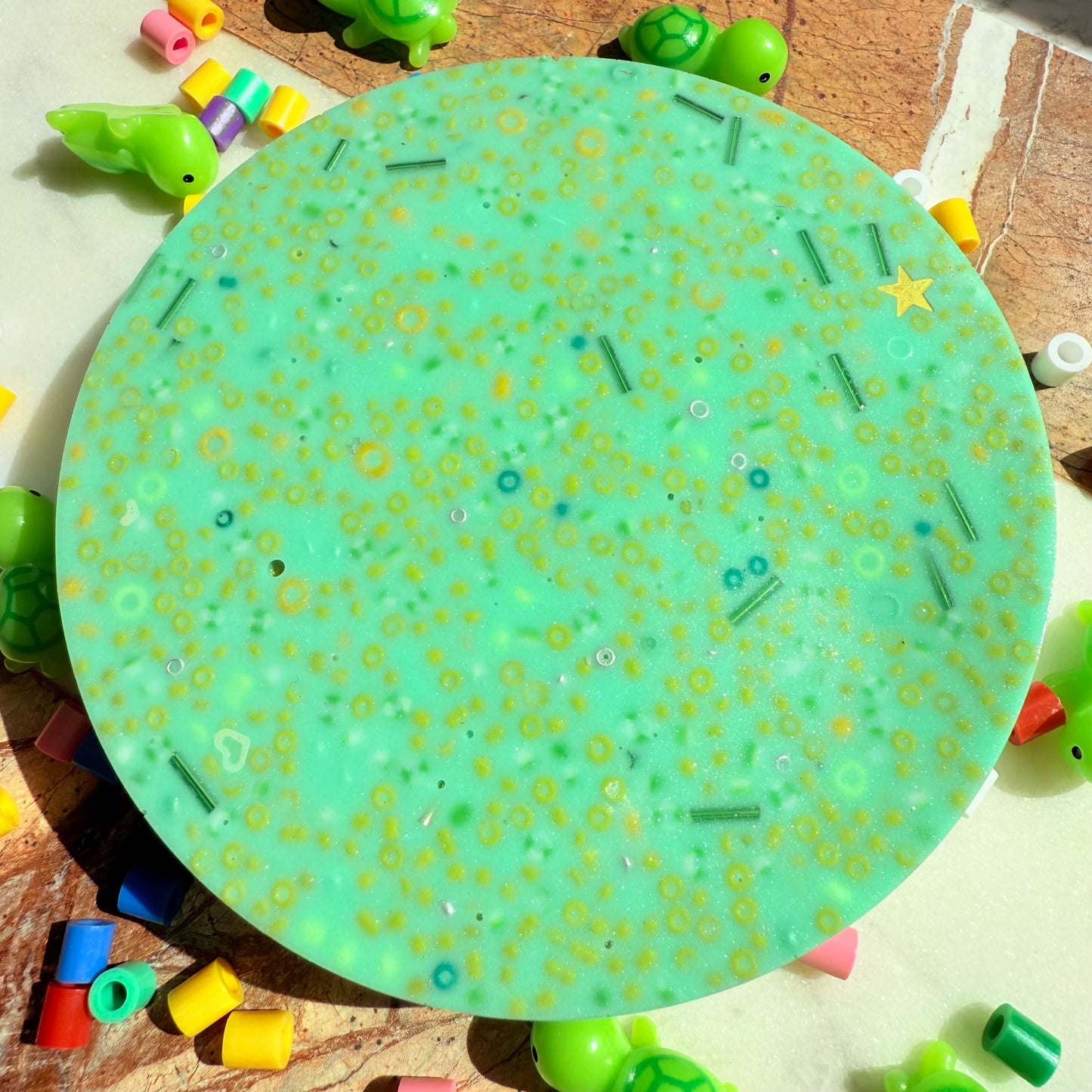 Close up of textured beads in remeltable turtle picky pad sensory toy