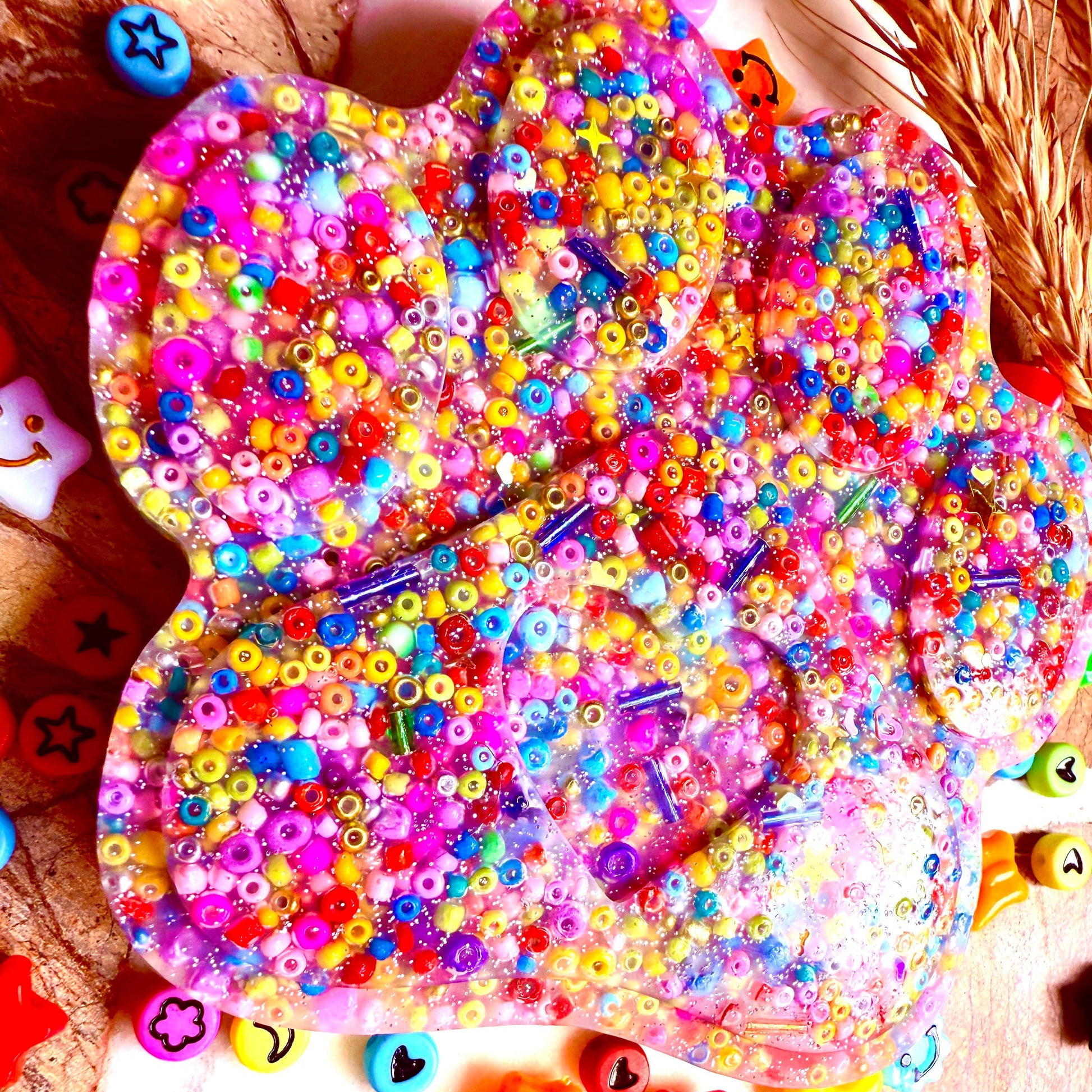 Close up of textured beads in large paw picky pad sensory toy